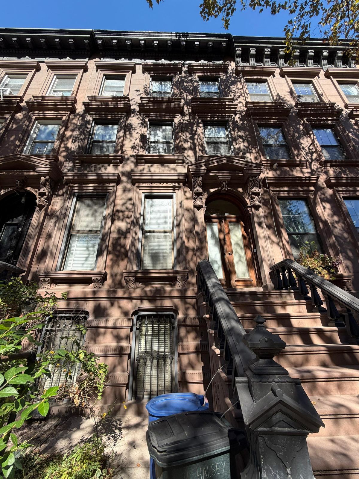 Brooklyn brownstone façade restoration with detail repair on Halsey Street