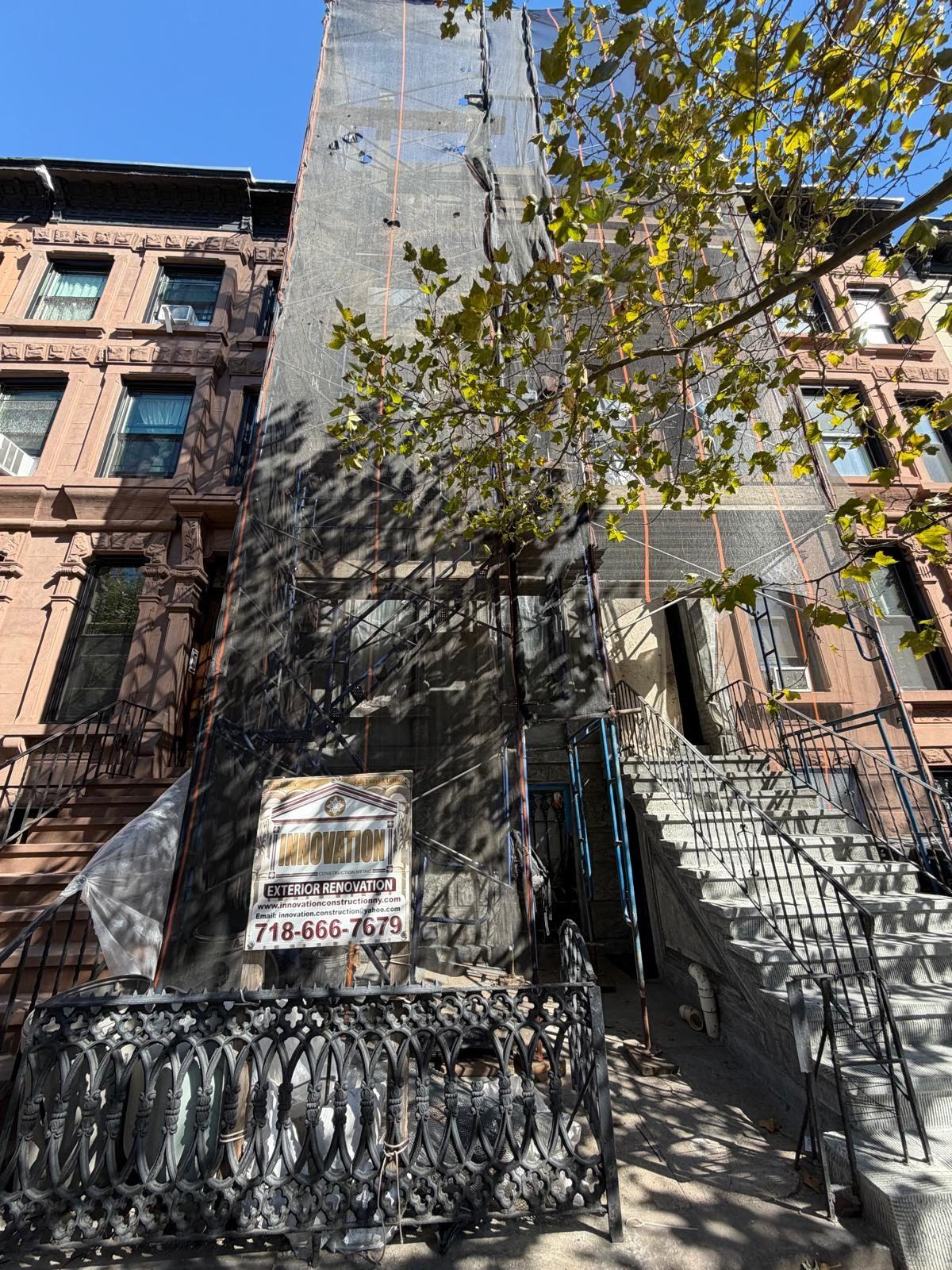 Interior plaster restoration and historic finish painting in a Brooklyn brownstone